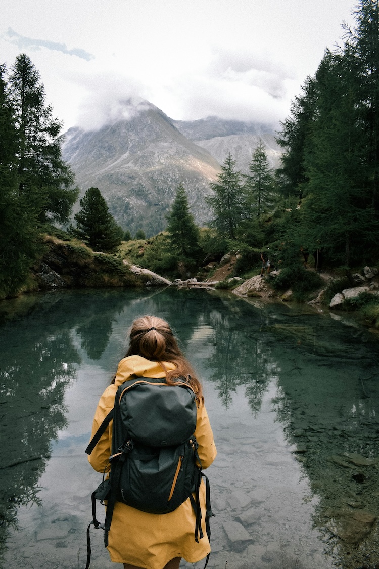 person hiking in mountains